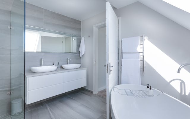 a%20modern%20white%20bathroom%20with%20a%20double%20vanity